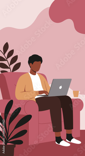 African American man works on a laptop in a cozy home armchair, symbolizing remote work, digital lifestyle, and comfortable productivity. Perfect for business and tech.