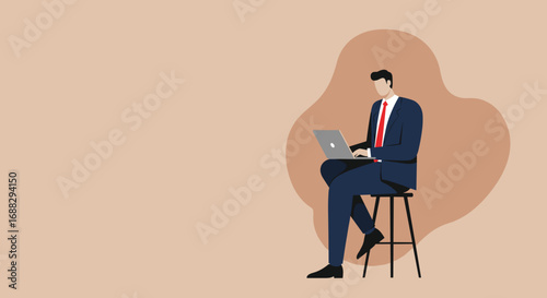 Professional businessman focused on work, using a laptop while seated on a stool. Ideal for concepts of remote work, productivity, technology, and corporate success.