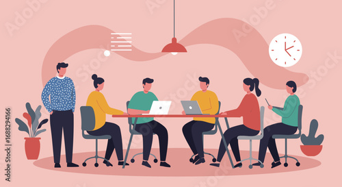 Diverse team collaborating in a modern office. People working together at a table with laptops, reflecting teamwork, productivity, and innovation in business.