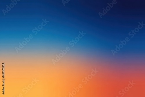 Abstract gradient of blue and orange colors.  Soft, blurred transition from deep blue to warm orange-red