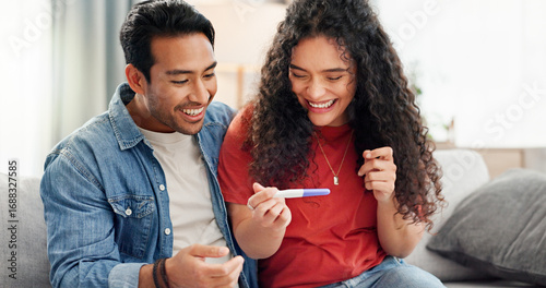 Pregnancy test, happy and couple on sofa excited for fertility success, results and parenting news. Relationship, pregnant and man with woman celebrate with medical kit for ivf treatment or ovulation