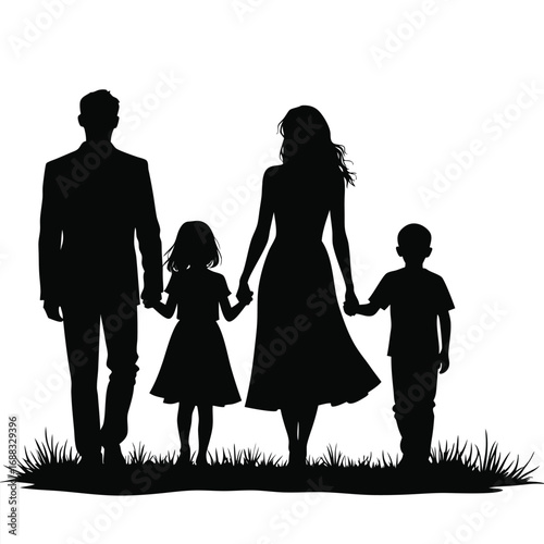 Black silhouette of a family holding hands walking on grass