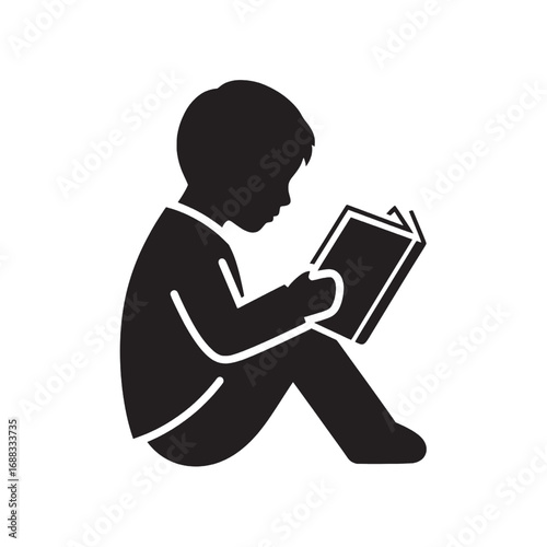 A simple black silhouette of a young boy sitting on the floor, deeply engaged in reading a book, symbolizing childhood learning and literacy