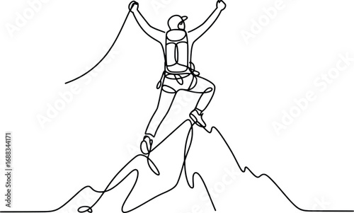 Athlete celebrates triumphant peak ascent with raised arms and climbing rope outdoors