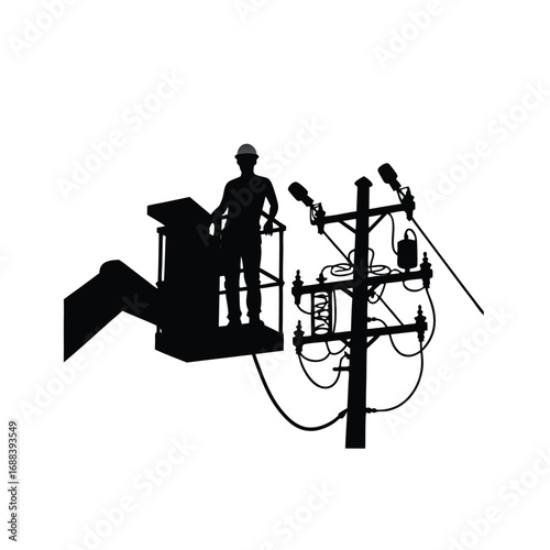Electrician in cherry picker working on power lines