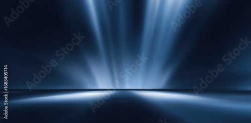 Blue rays project upwards from a reflective surface in a dark setting. The light creates a minimalist and ethereal scene