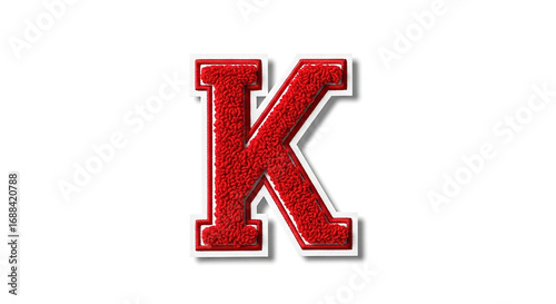 A textured red letter k with a white trim isolated on a plain white background resembling a traditional varsity letter patch