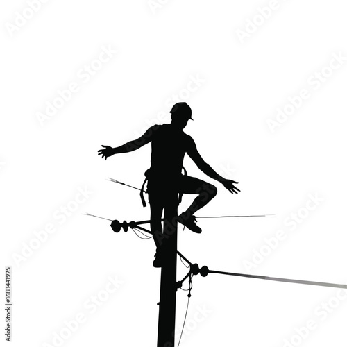 Silhouette of lineman working on utility pole electricity