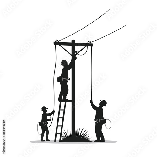 Silhouettes of linemen working on utility pole lineman