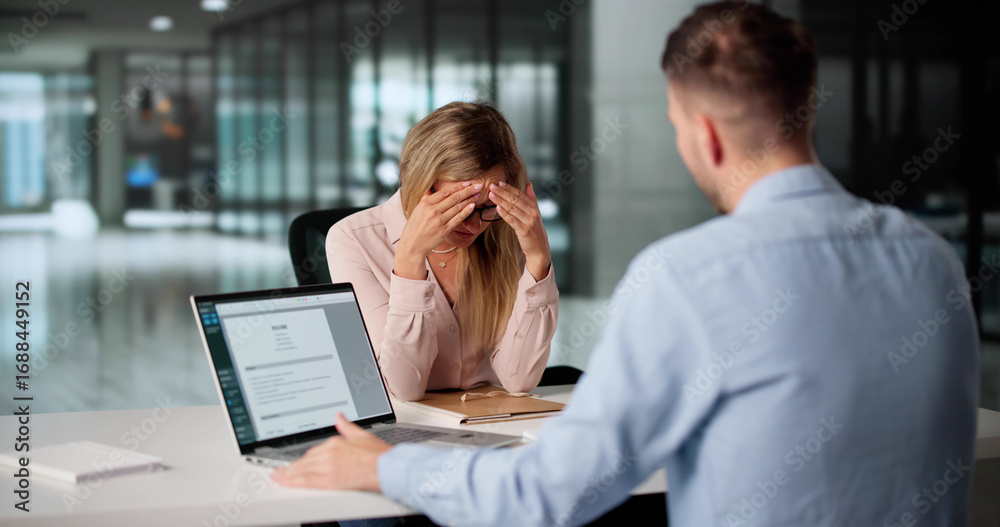 Fototapeta premium Businesswoman In Disciplinary Meeting With HR Investigator