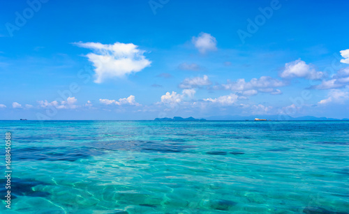 Seascape of Lipe island with clear water and blue sky with cloud.