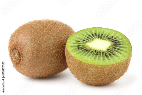 Kiwi halved fruit placed next to a whole kiwi. isolated on white background.