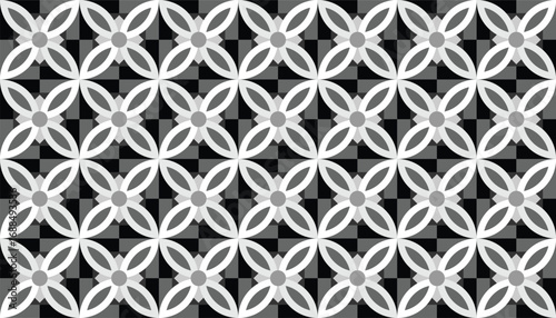 Vector illustration of an abstract floral geometric pattern in black, white, and gray tones. The repetitive design creates an elegant, modern, and minimal look