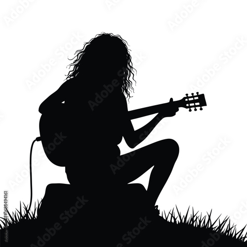 Silhouette of a woman playing acoustic guitar outdoors 3