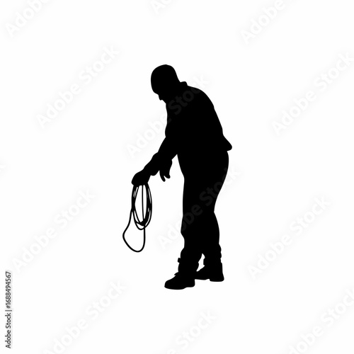 Silhouette of healthcare worker safely disposing of used medical tubing