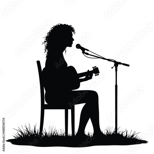 Woman playing guitar and singing into microphone silhouette 3