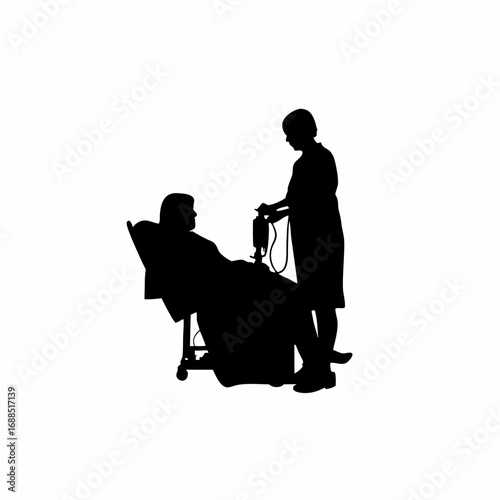 Silhouette of medical technician caring for patient on dialysis