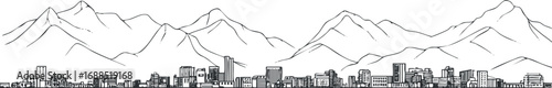 Black and white city skyline with detailed buildings and mountains in the background