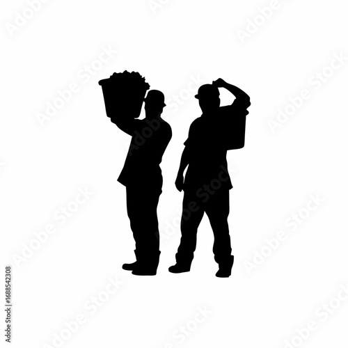 Silhouette of two people harvesting grapes together in a vineyard