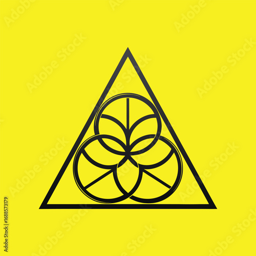 An abstract yellow and black triangle vector illustration for a radioactive hazard warning sign