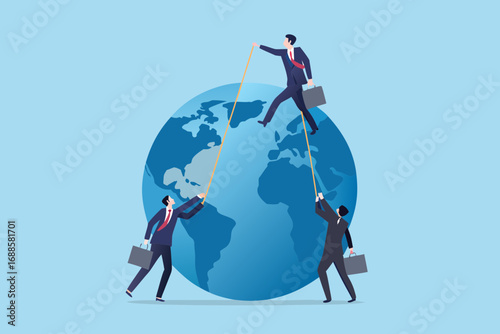 Businessmen working together to navigate and control the globe with ropes