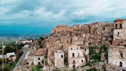 Picturesque daylight aerial perspective of medieval Craco ruins in Basilicata