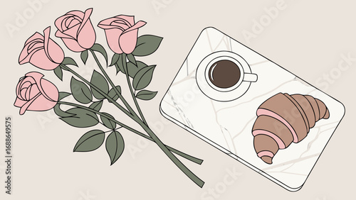 A delicate bouquet of pink roses rests beside a marble tray holding a cup of coffee and a croissant