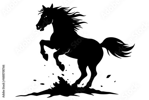 Black silhouette of a rearing horse with dust and debris