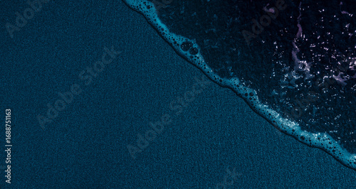 Dark beach, top view 