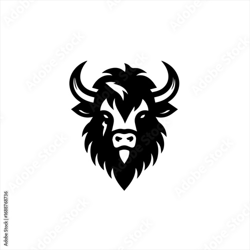 Black silhouette of a fierce bison head with horns and shaggy fur