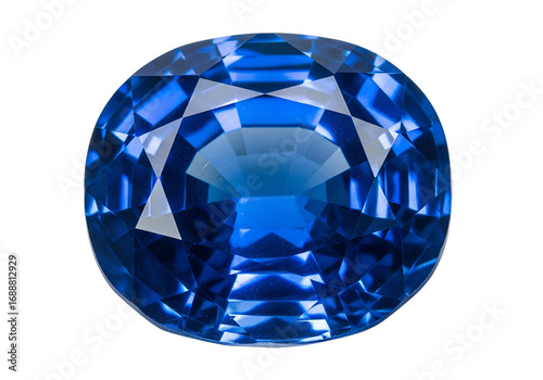 Close-up of a magnificent, oval-cut sapphire, exhibiting brilliant facets and captivating deep blue hues against a stark black backdrop.