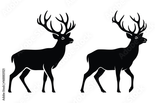 Two black silhouette deer with large antlers facing right on white background stag animal