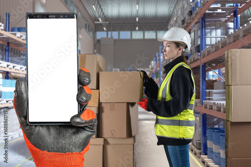 Warehouse. Worker in hard h...