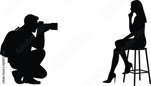 Silhouette of Photographer with Backpack Taking Picture of Female Model Sitting on Stool During Studio Photoshoot Session for Fashion