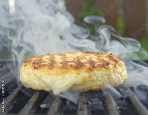 Grilled cheese patty on hot grill