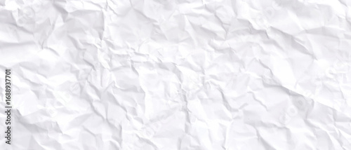 crumpled white paper sheet with a rough surface and vintage creases. Crumpled paper texture background.