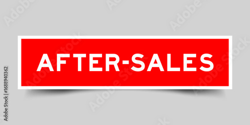 Red color square shape sticker label with word after sales on gray background
