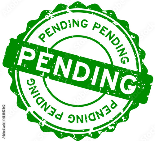 Grunge green pending word round rubber seal stamp on white background