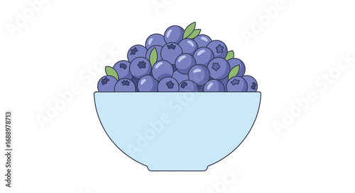 A Generous Serving of Fresh Ripe Blueberries Overflowing a Light Blue Bowl Filled with Green Leaves for a Healthy Snack Option