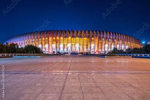 Wallpaper Mural Illuminated modern sports stadium at night with bright lights Torontodigital.ca