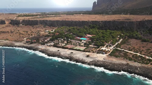Aerial View of Rocky Seashore with Camping Site in San Vito Lo Capo, Popular Travel Destination Sicily Italy
