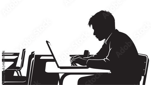 Silhouette of Student Typing on Laptop in Classroom