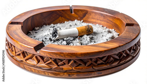 Wooden ashtray nearly full of cigarette ash with symbolic message isolated on white