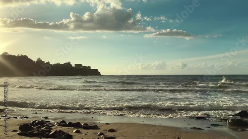 Romantic Sunset on Seashore with Golden Sky and Calm Waves, Tranquil Evening Mood