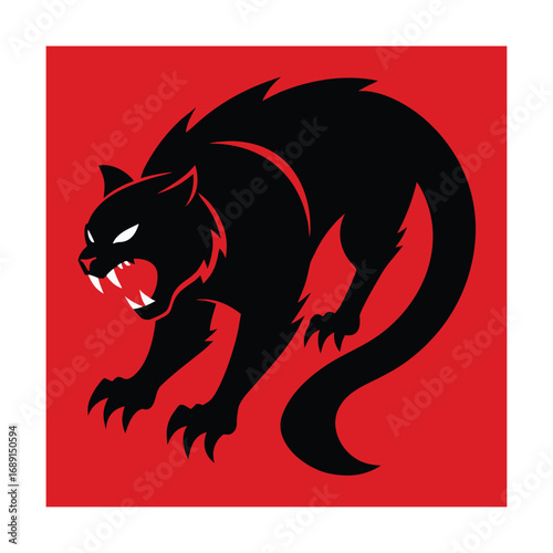 Aggressive black cat with bared teeth on red background