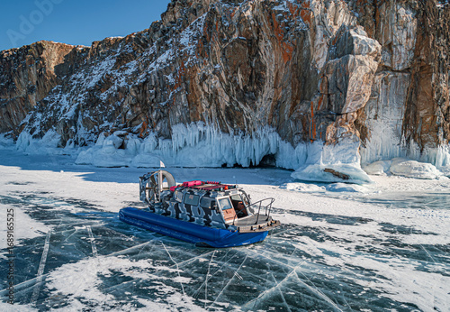 Cuadro en lienzo Hovercraft parked on a blue cracked ice of the lake Baikal