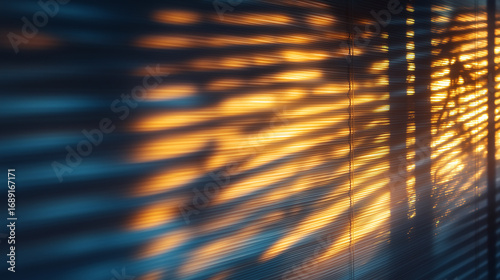Sunlight casting striped shadows through blinds on wall