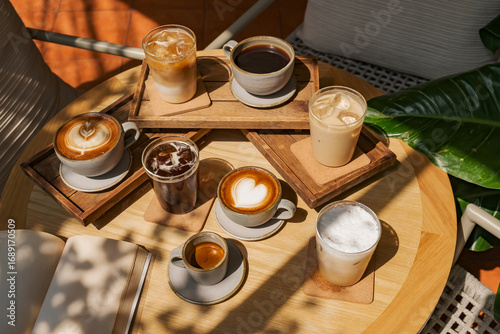 many menu type of coffee set on wooden table