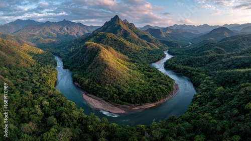 Panoramic shot of Peruvian Amazon selva peruana winding river surrounded by dense rainforest golden hour lighting adventure travel photography