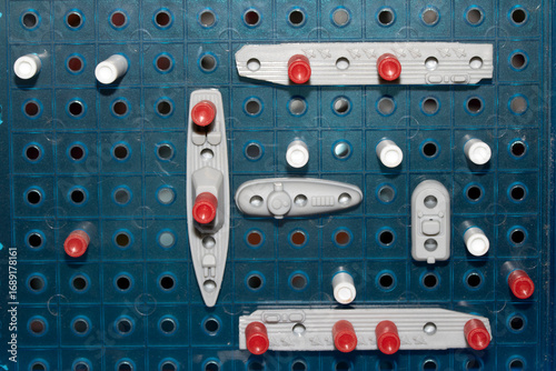 Wall Mural Close up of strategic battleships board game with ships and pegs